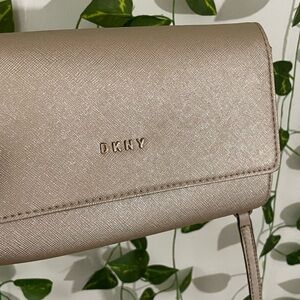 DKNY bag, gold, never used, no callouts, retails for $200 BNIB